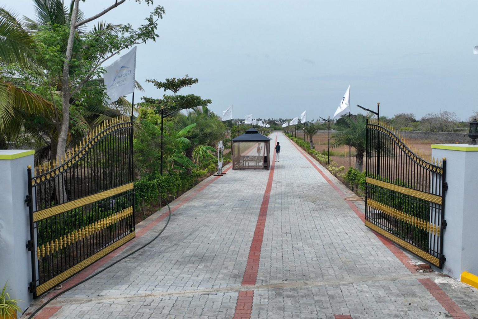 Mannvaasam Farms site entrance, ECR Poonthandalam
